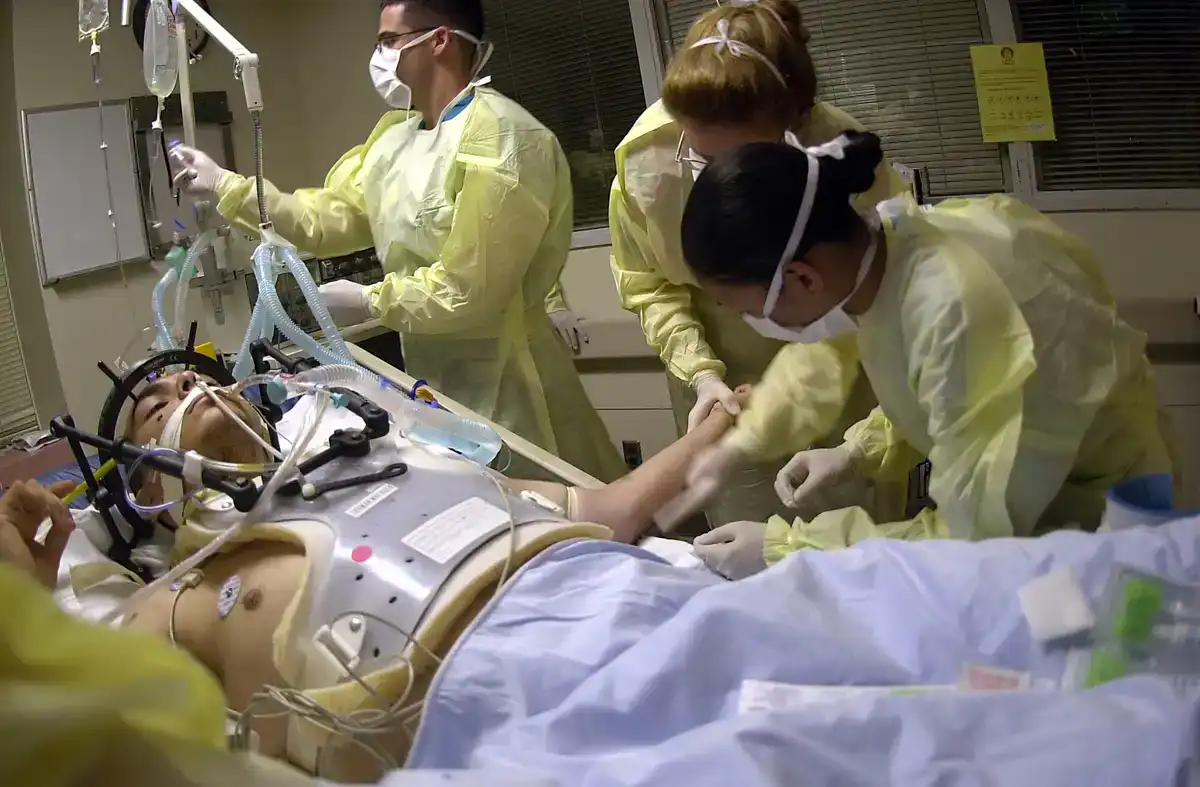 US Navy hospital corpsmen provide free dental and medical care to civilians during a medical readiness exercise